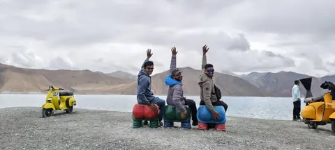 Namaste Adventures group beside Pangong Lake in Ladakh